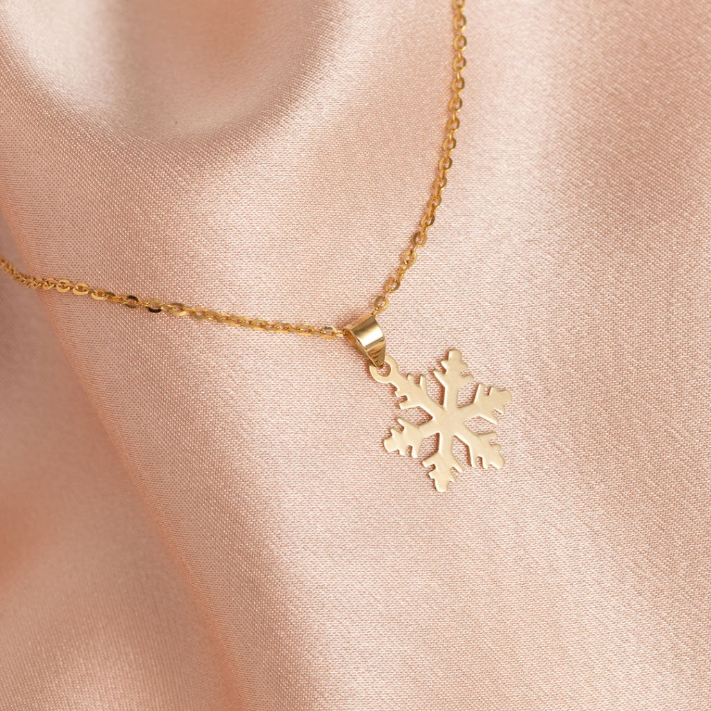 9ct Gold Snowflake Necklace on silk