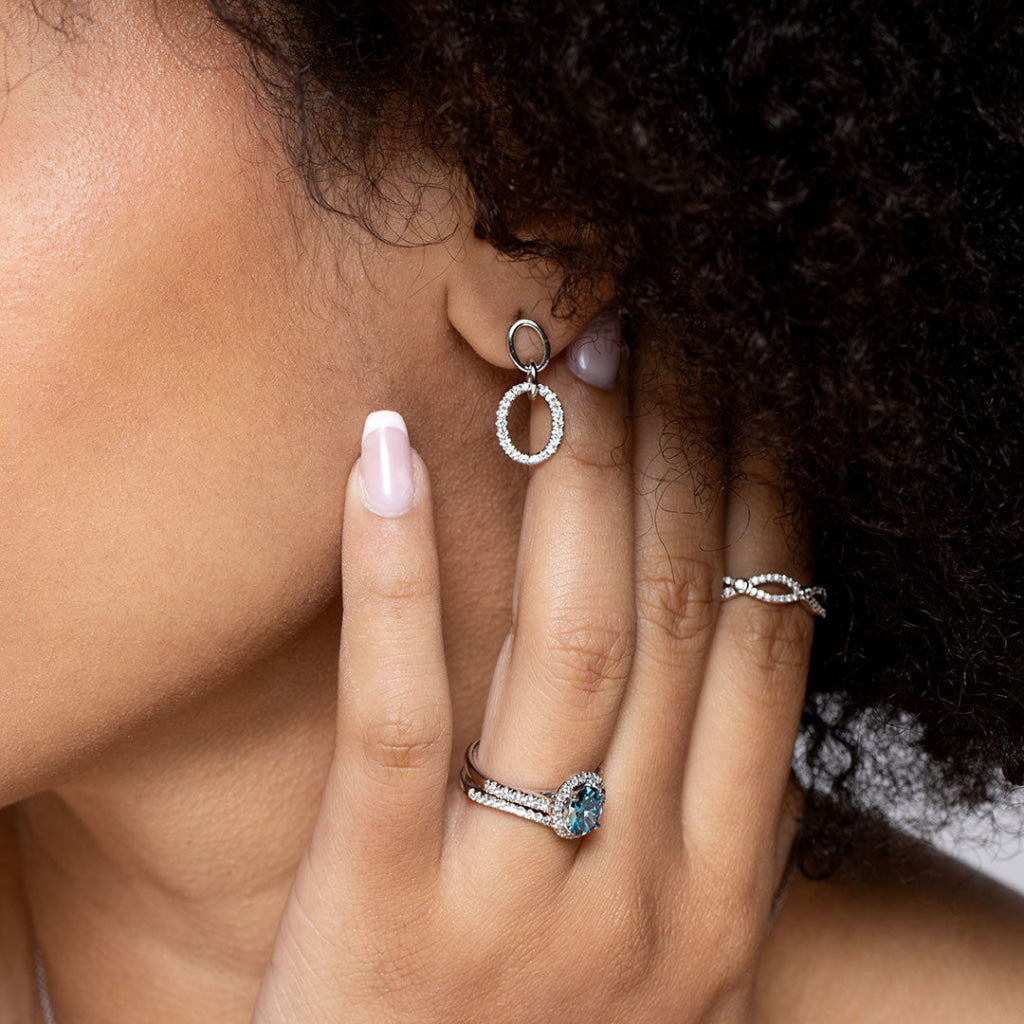 Diamond drop Earrings worn by model 4