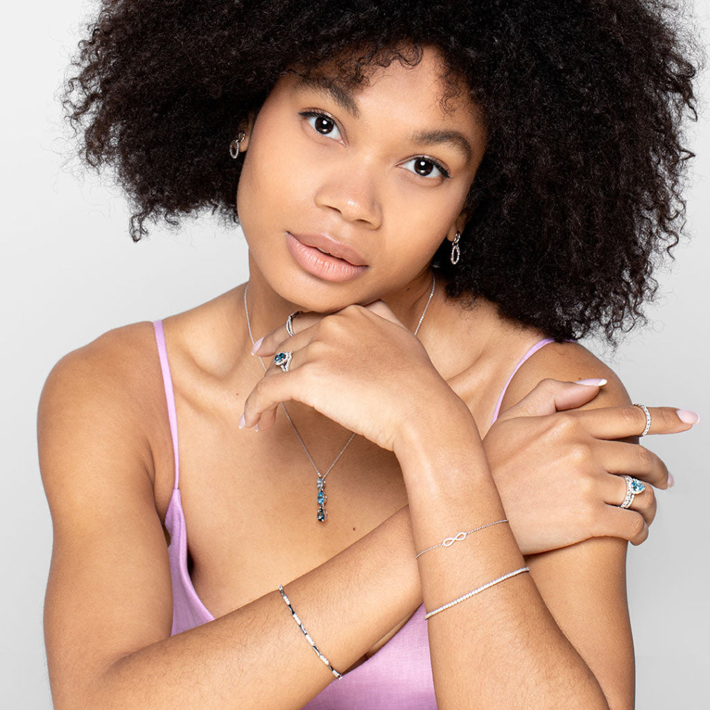 Diamond drop Earrings worn by model 2