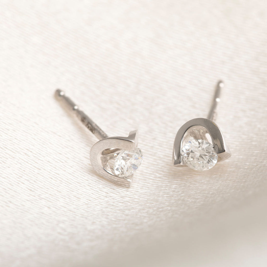 close up of diamond earrings