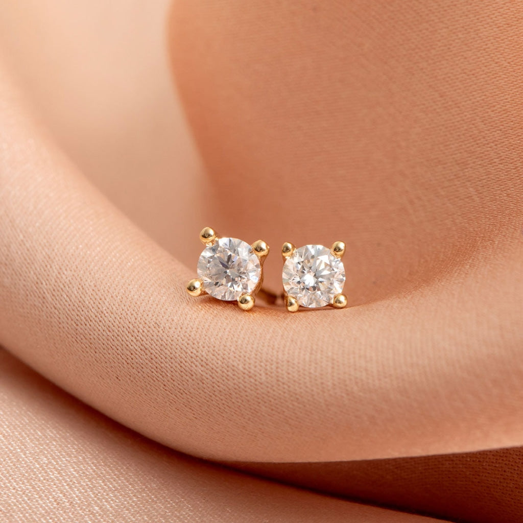 diamond earrings on fabric