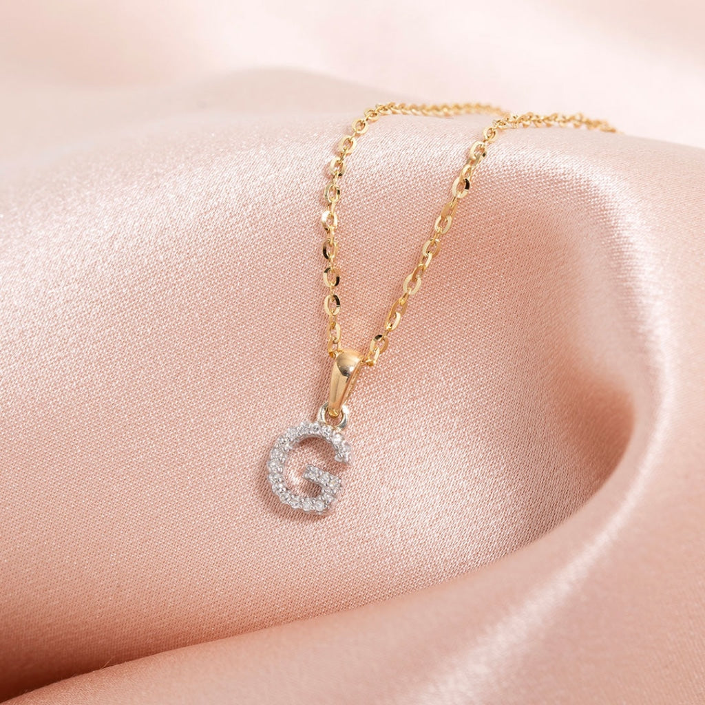 9ct gold initial necklace with diamonds on a gold chain