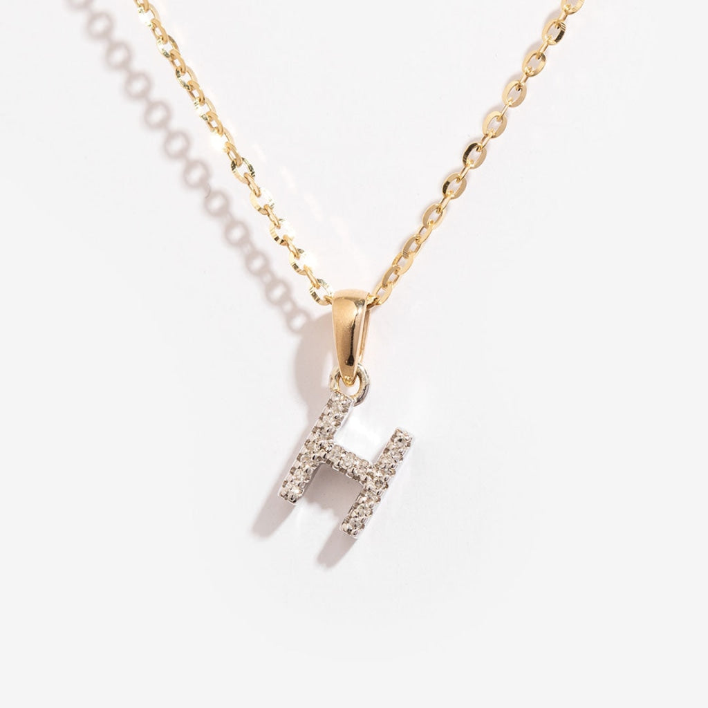 Diamond initial h necklace on gold chain