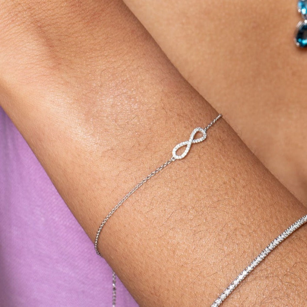 diamond infinity bracelet on arm 1