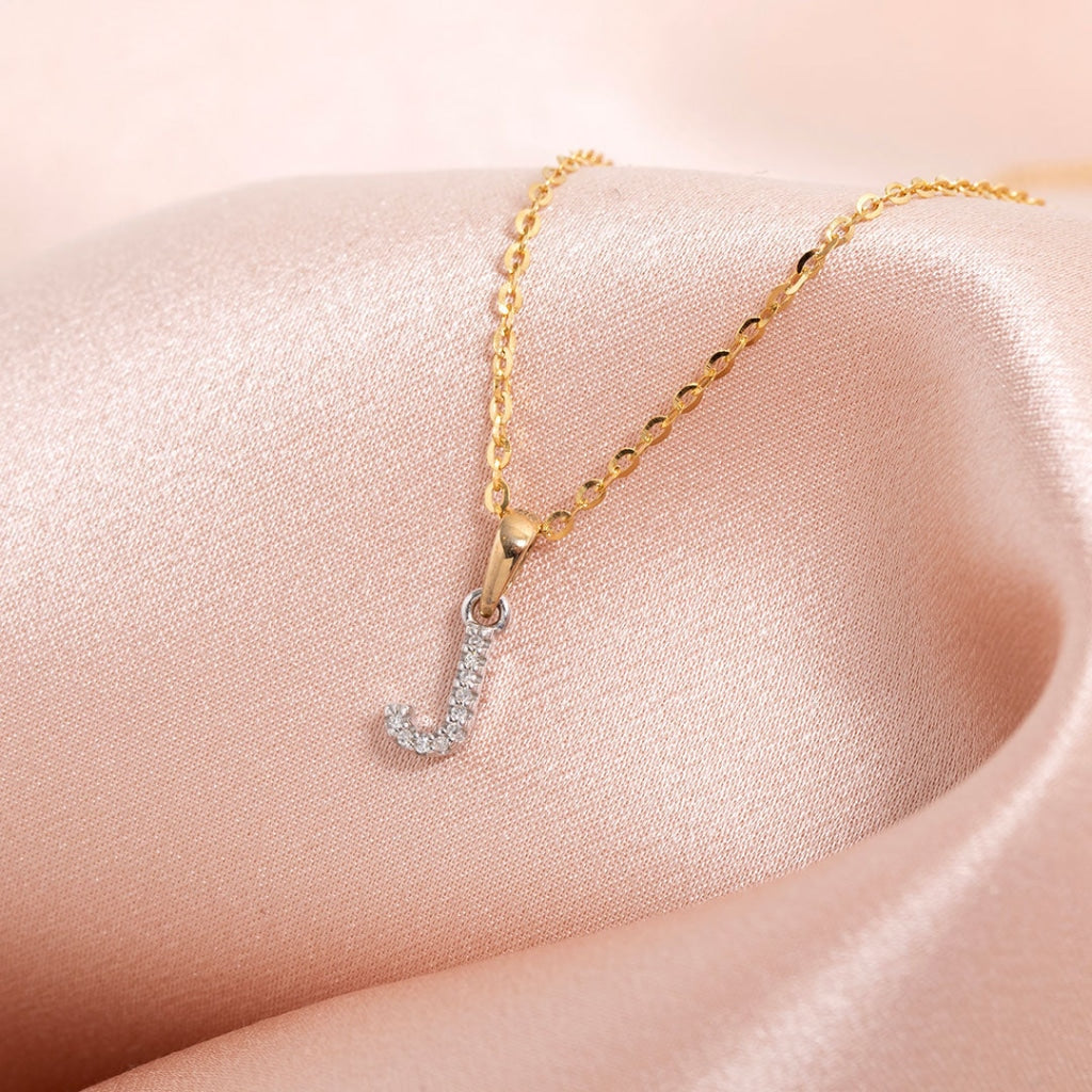 Small gold and diamond initial J necklace