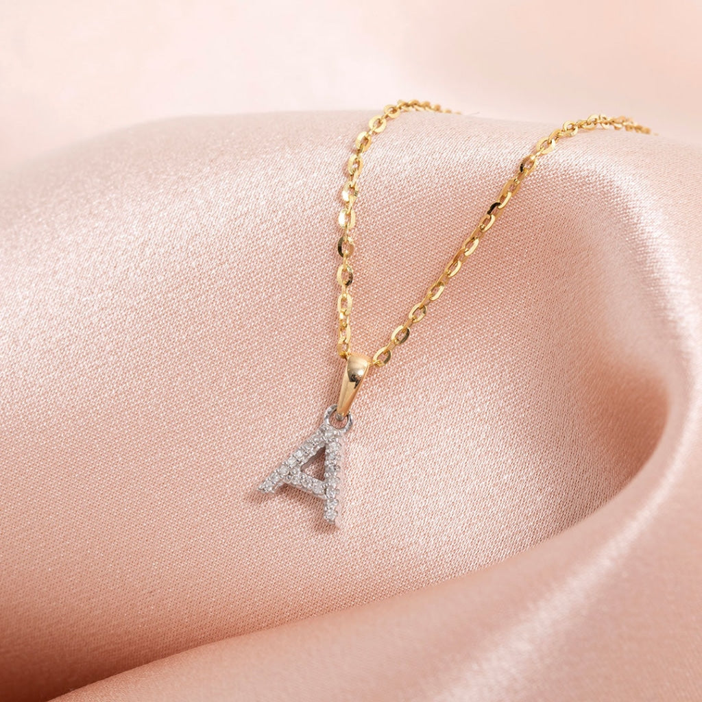 Diamond initial A necklace with a gold chain