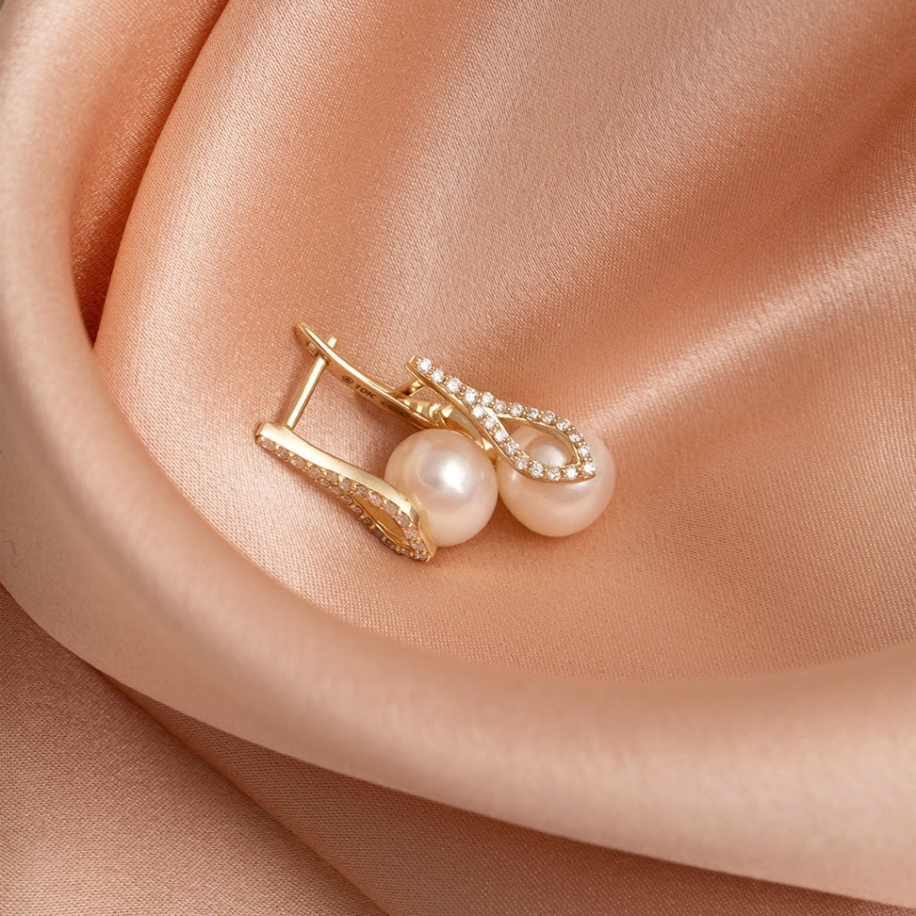Diamond and pearl earrings side and front image
