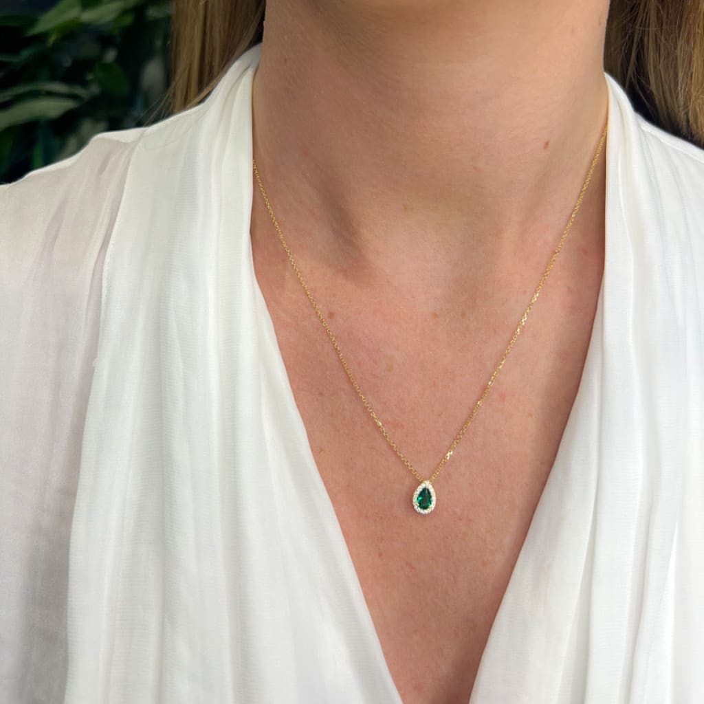 DROP OF COLOUR NECKLACE Green - 9ct gold - displayed on ladies neck