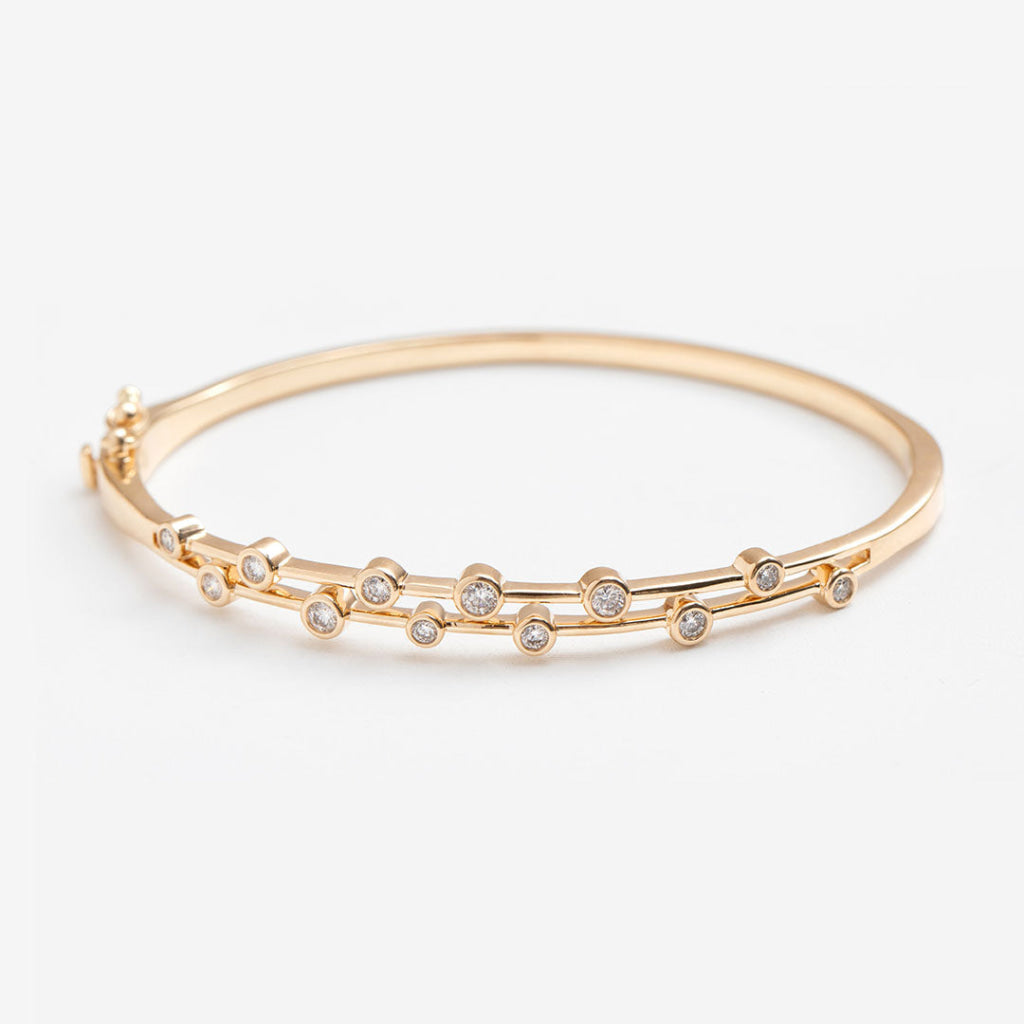 rub over diamond bangle yellow gold