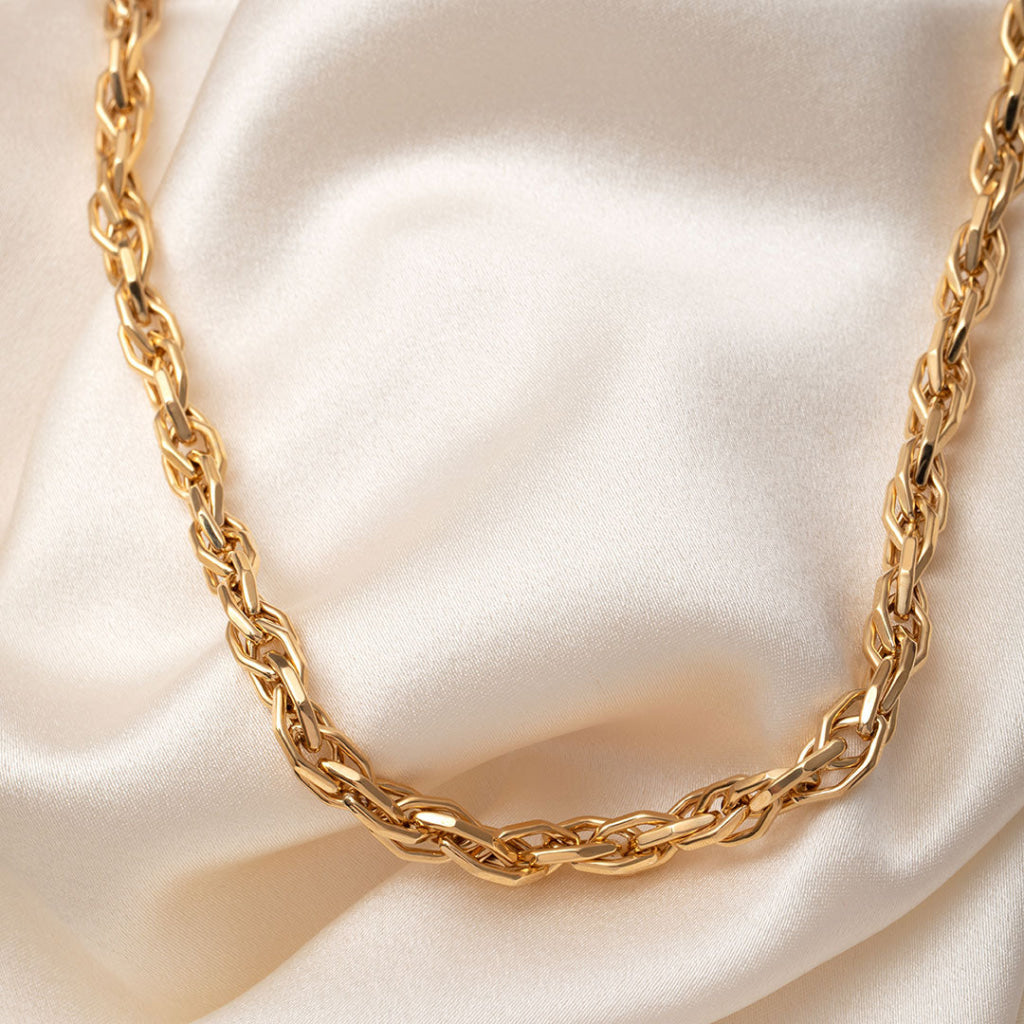 close up of yellow gold fancy link chain