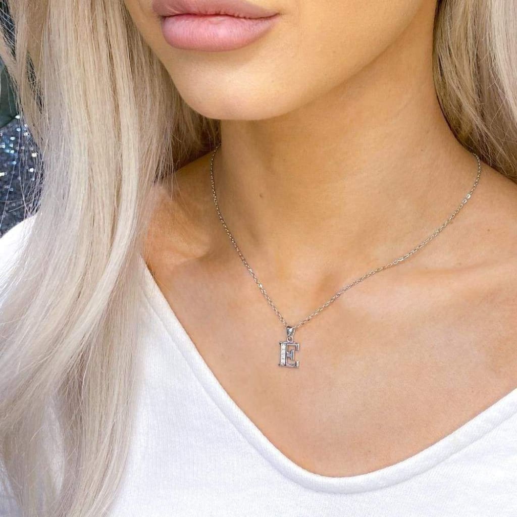 Woman wearing Sterling Silver E Initial Necklace_new