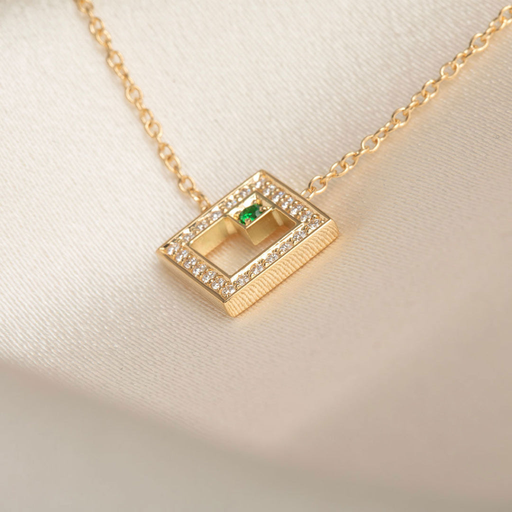 yellow gold diamond necklace with tsavorite