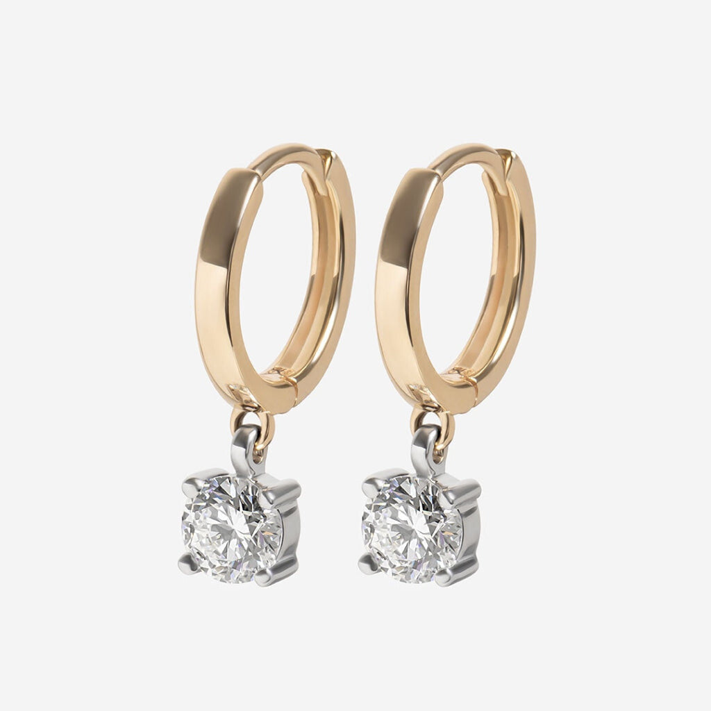 Ely round diamond earrings on white background