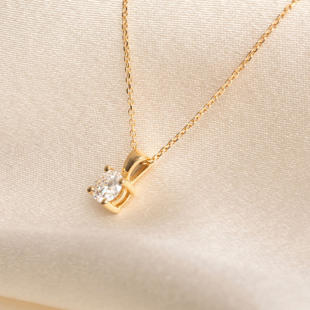 side view of diamond necklace yellow gold