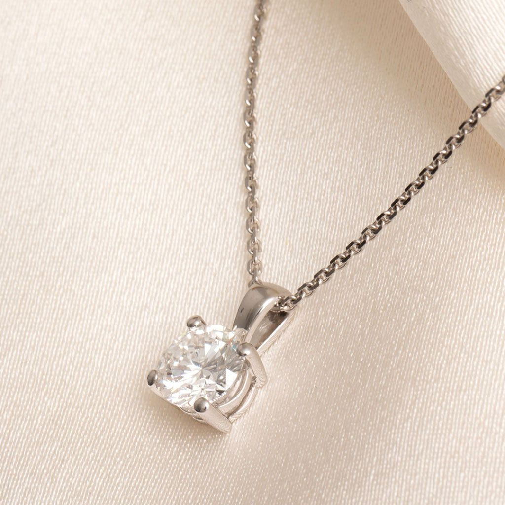 diamond pendant on white gold trace chain