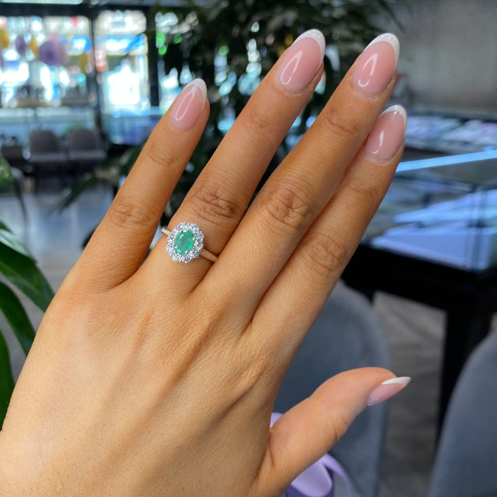 18ct Gold Diamond and Emerald ring on hand
