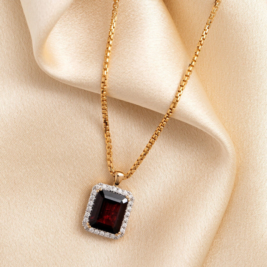 Garnet necklace on fabric