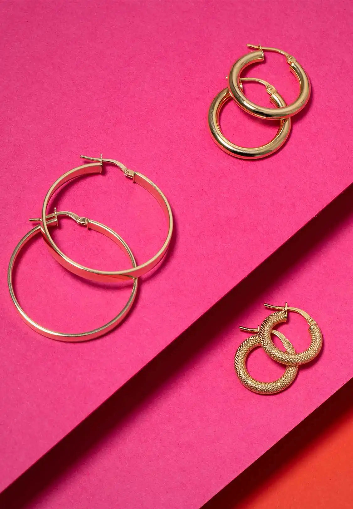 Gold hoop earrings.