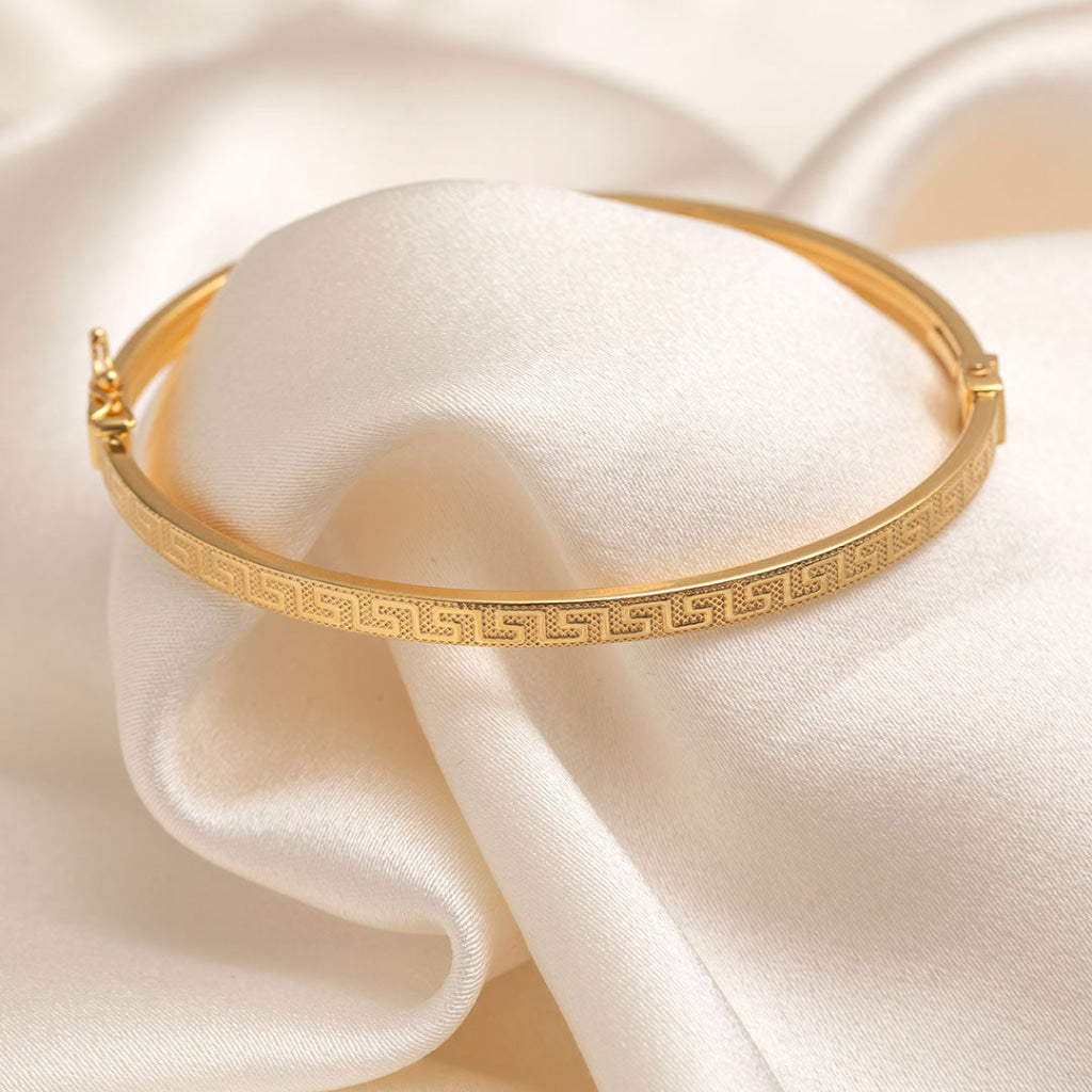 yellow gold engraving detail bangle