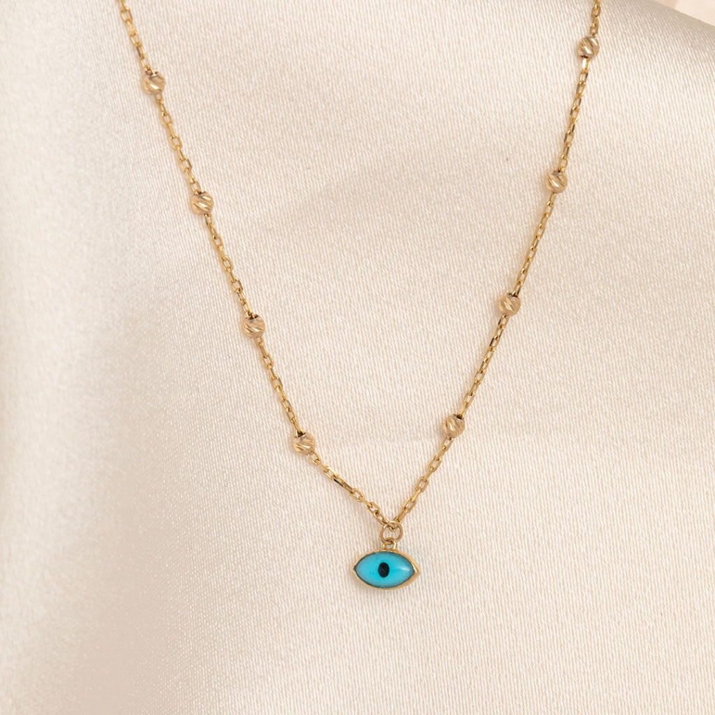 yellow old beaded chain and blue evil eye necklace