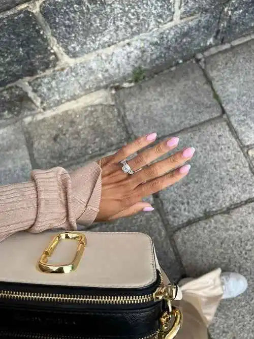 files/hand-pink-manicure-sparkly-engagement-ring.webp