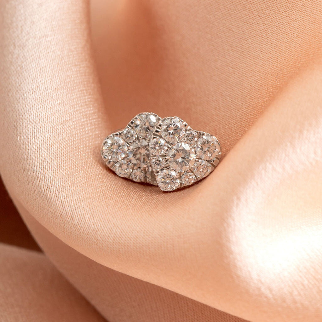 Heart Diamond Earrings.50ct on fabric