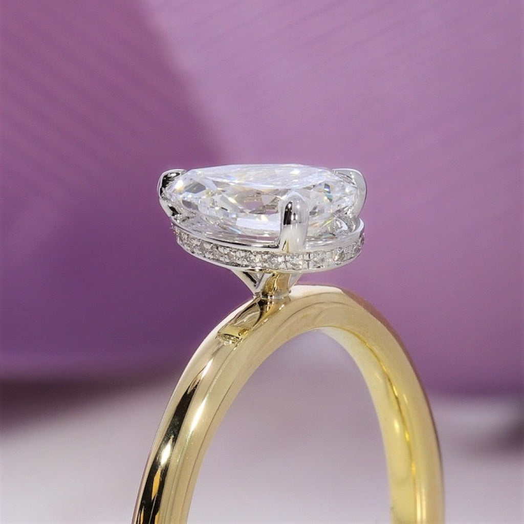 Photo of a Diamond Engagement Ring on a purple background