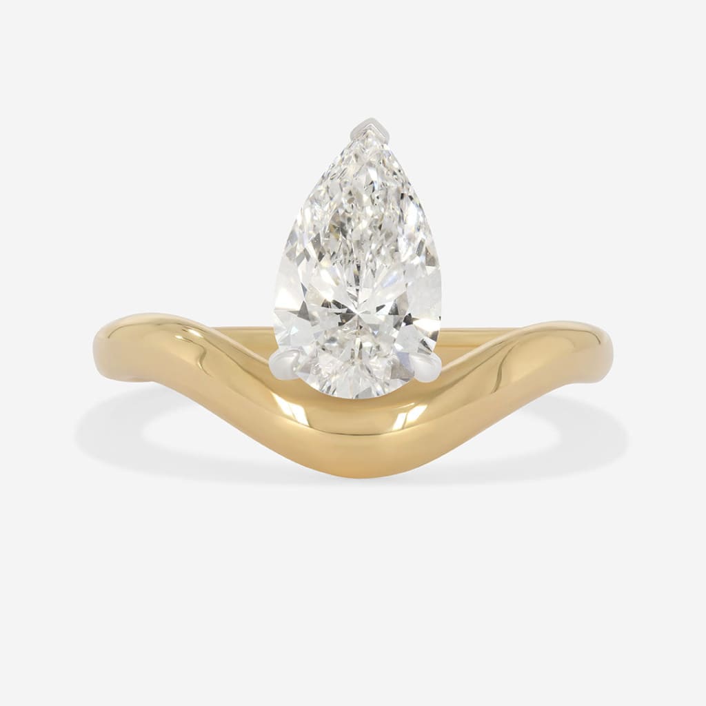 yellow gold pear cut engagement ring