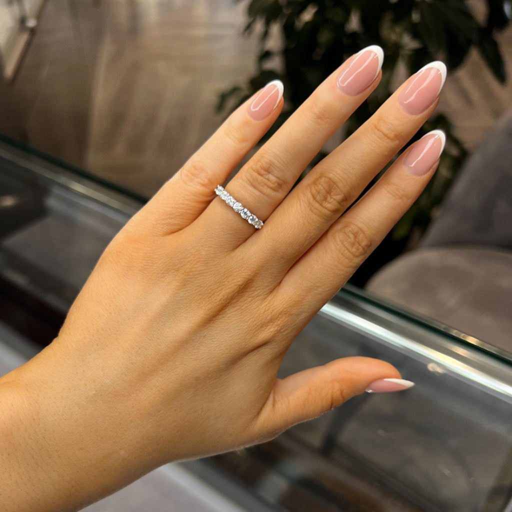 Woman's hand wearing Ivy 7 Diamond Eternity Ring