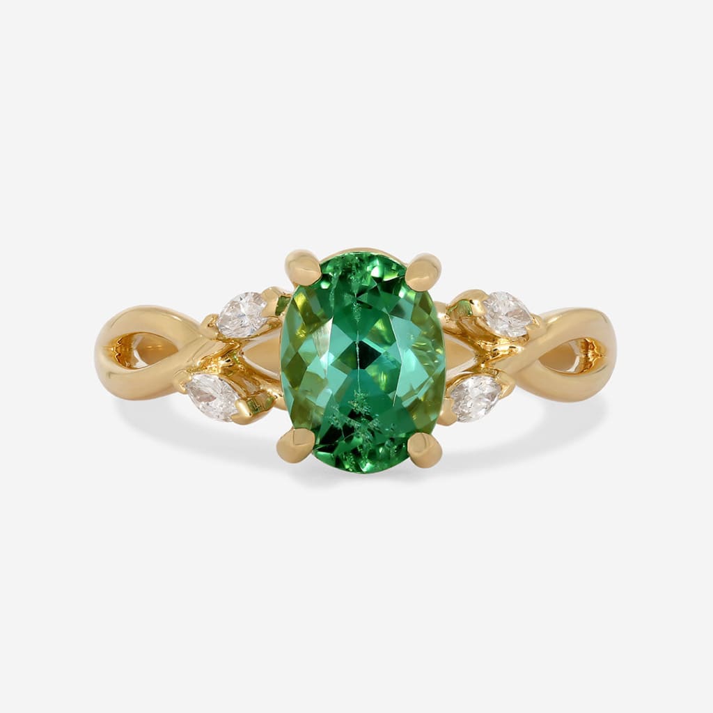 green tourmaline gemstone ring with twist band