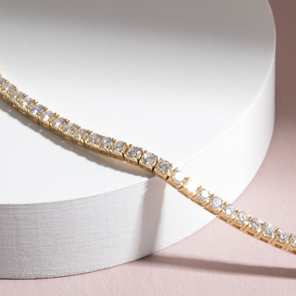 Lab Grown Diamond Tennis Bracelet laying flat on white background