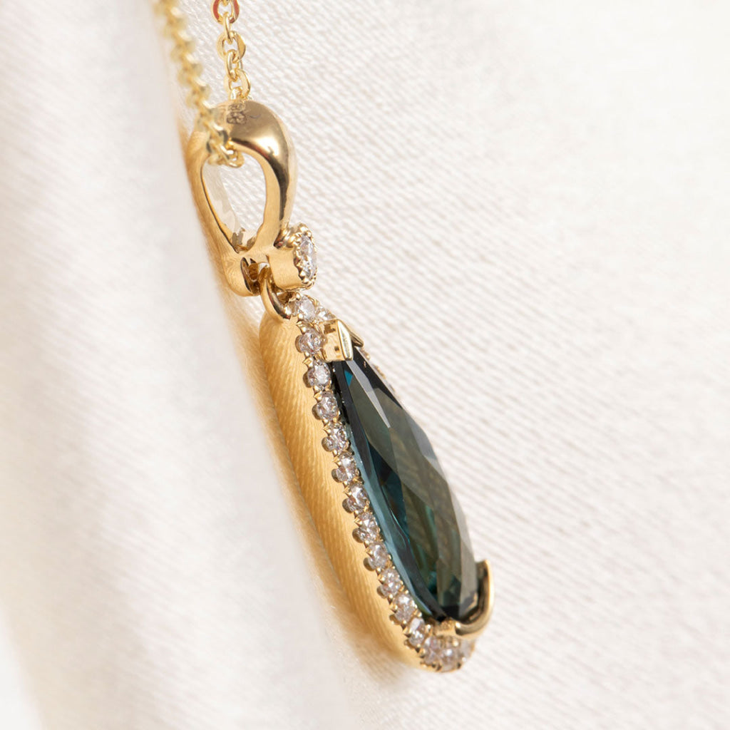 side view of london blue topaz necklace