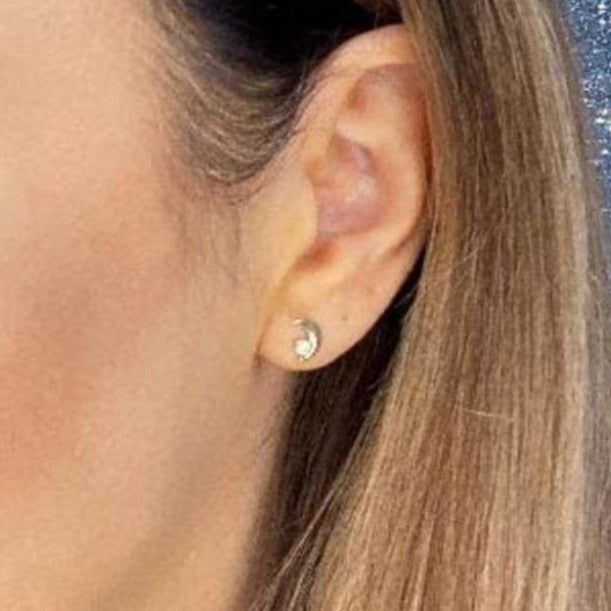 Woman wearing 9ct gold Magical Moonlight Earrings | Gear Jewellers Dublin