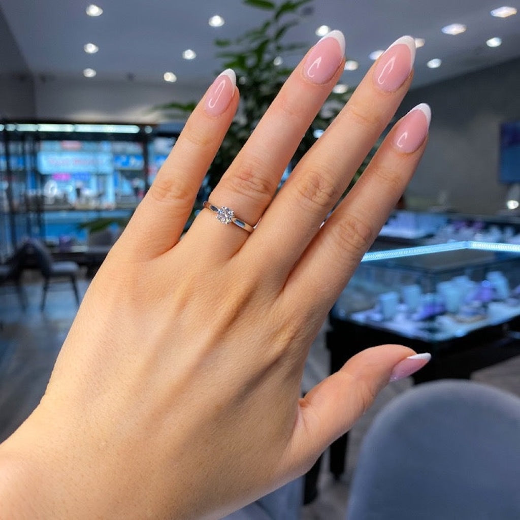 Woman's hand featuring Mars Diamond Engagement Ring