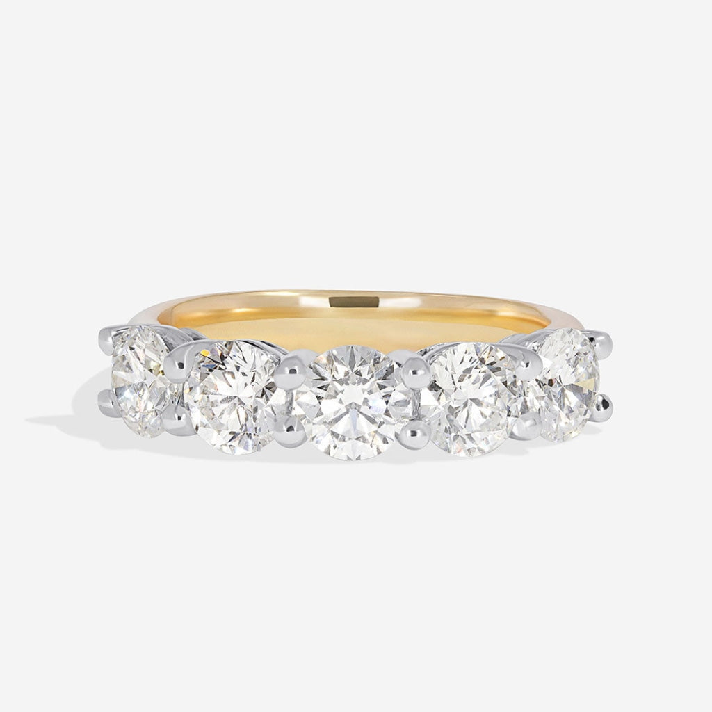 5 diamonds - shared claw eternity ring