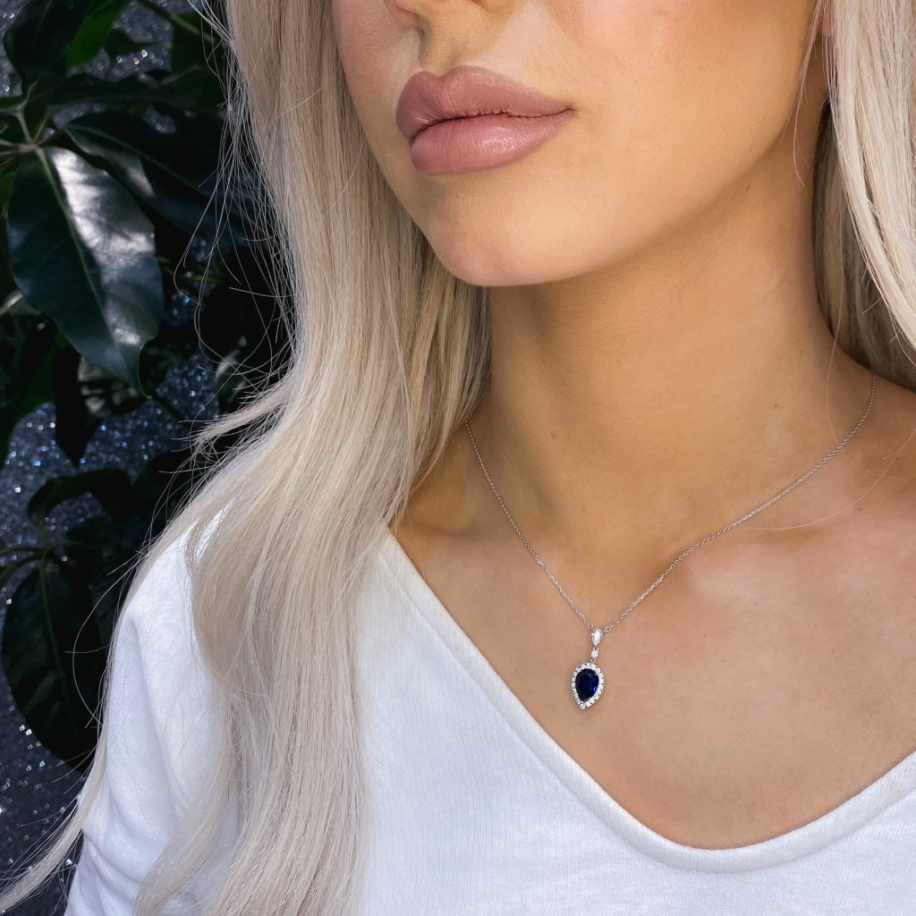 woman wearing sterling silver blue pear necklace 