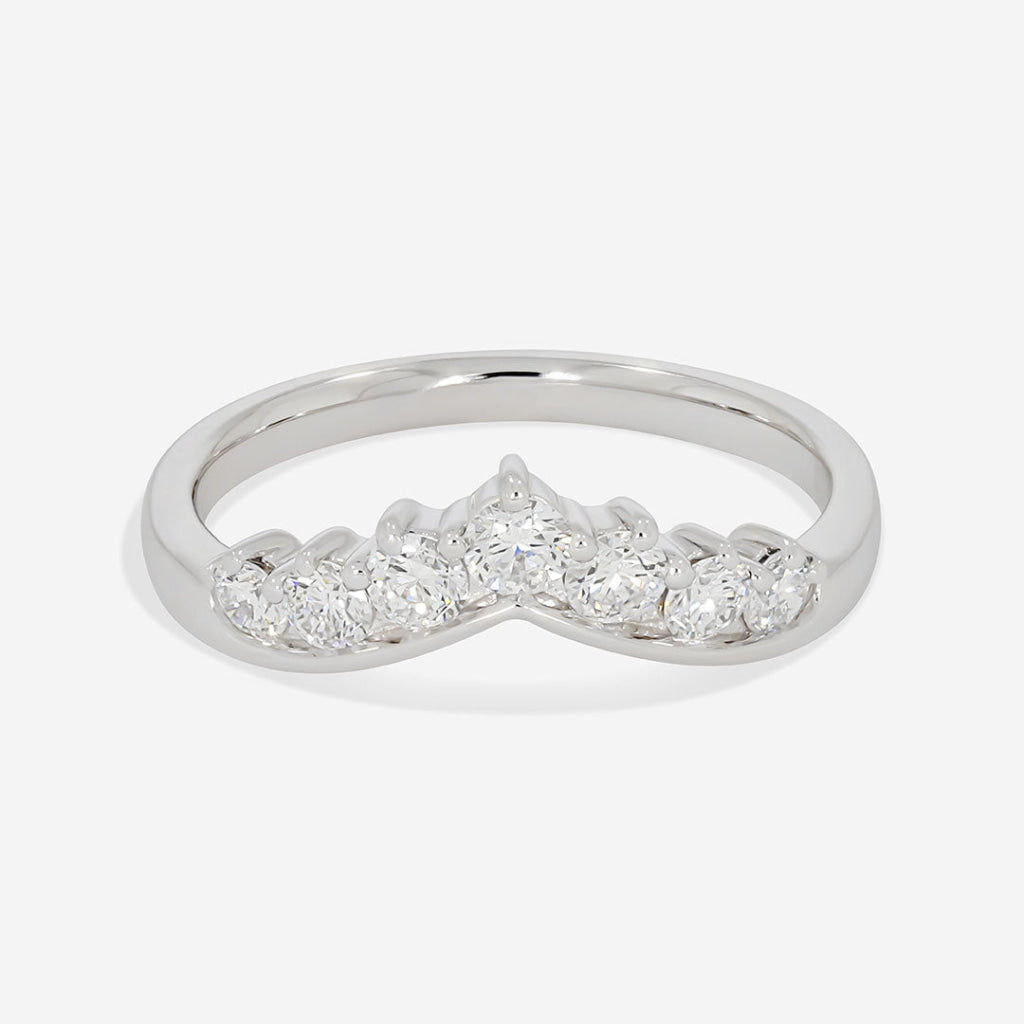 7 stone diamond wedding ring on white background