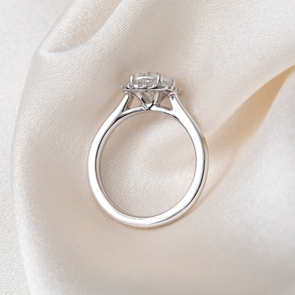 Cushion halo lab grown diamond engagement ring.