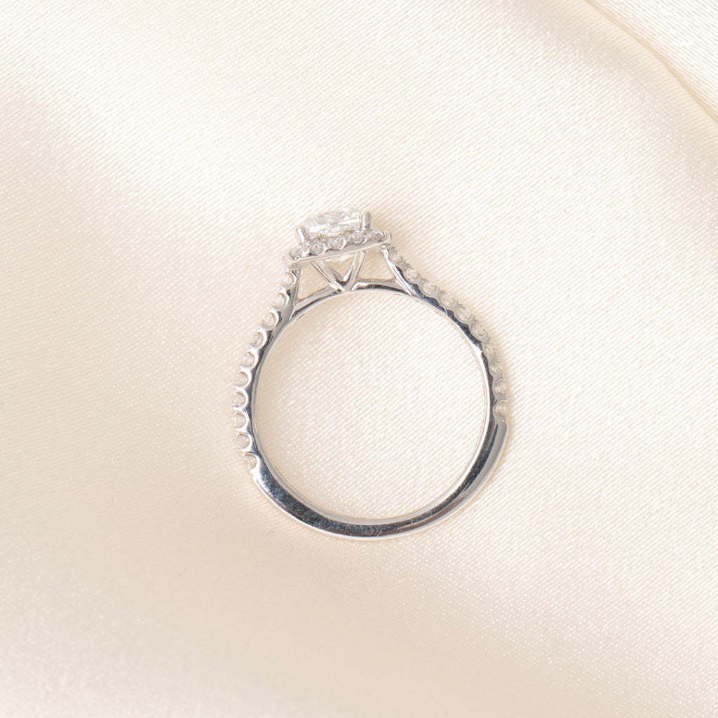 Cushion halo lab grown diamond engagement ring.