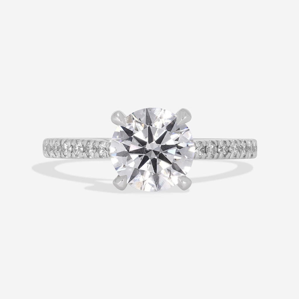 round diamond solitaire with diamond band