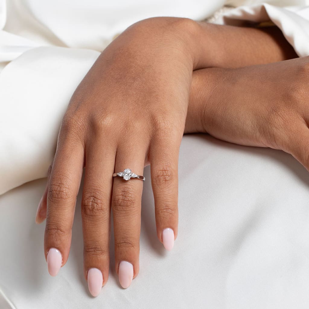 Three Stone Diamond Ring on Hand Model