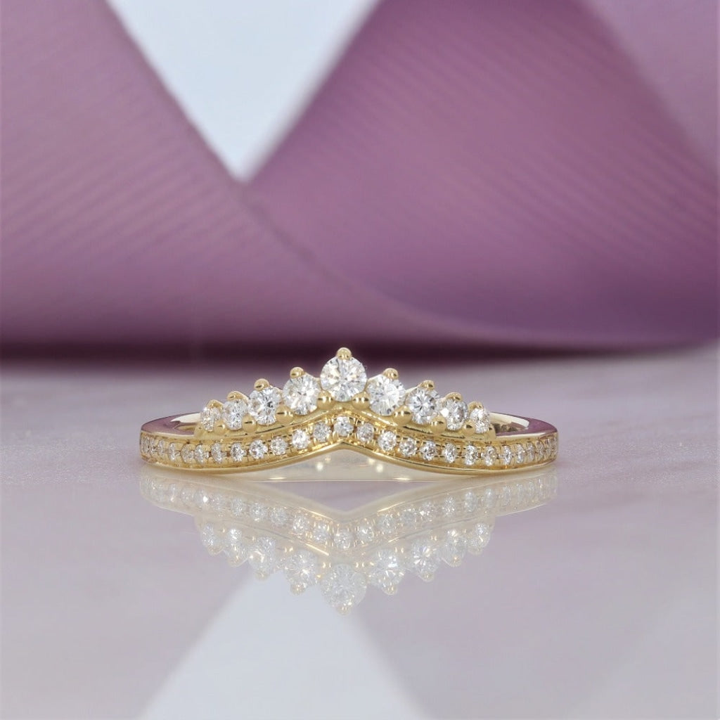 Shaped diamond set wedding ring made with 18ct gold
