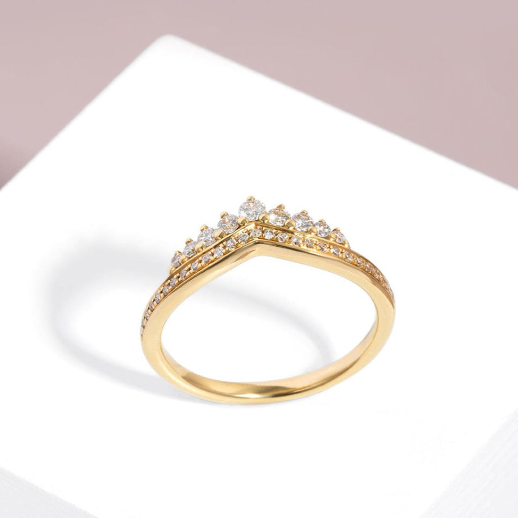 Shaped diamond set wedding ring made with 18ct gold