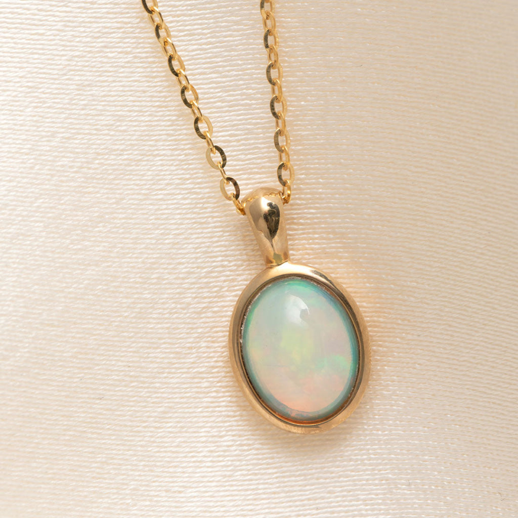 yellow gold bezel set opal necklace