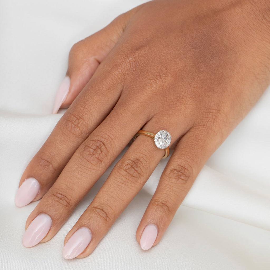 Oval Halo Diamond Engagement Ring on Model