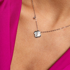 silver necklace on model