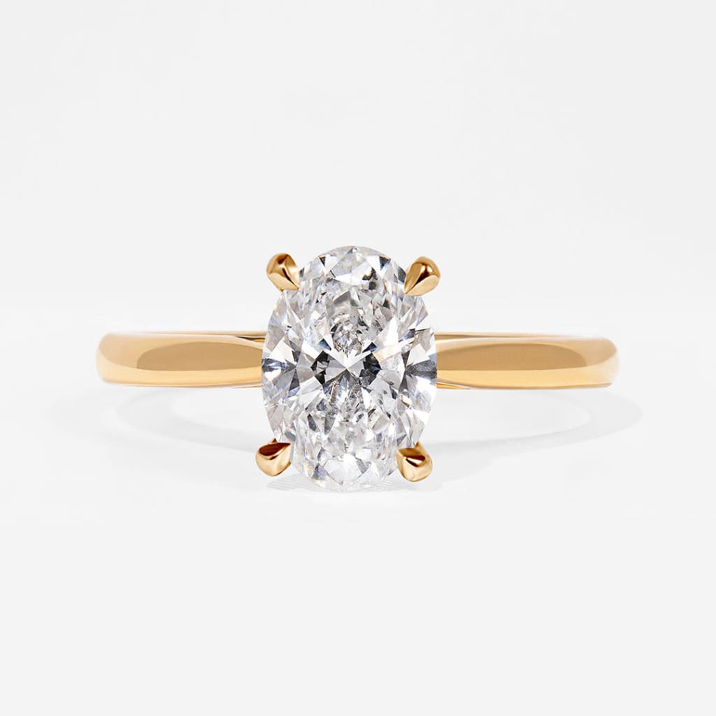 Paris all yellow oval diamond ring on white background