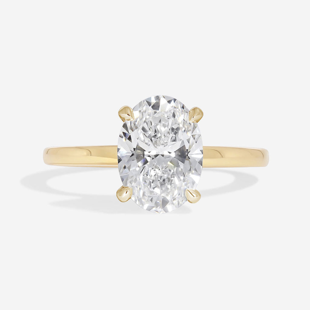 Paris 18ct yellow gold oval shape diamond engagement ring