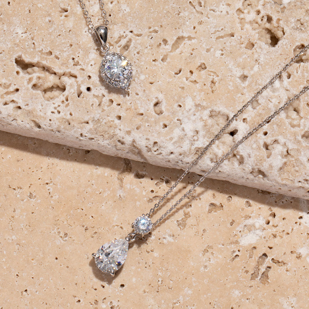 two white gold cubic zirconia necklaces