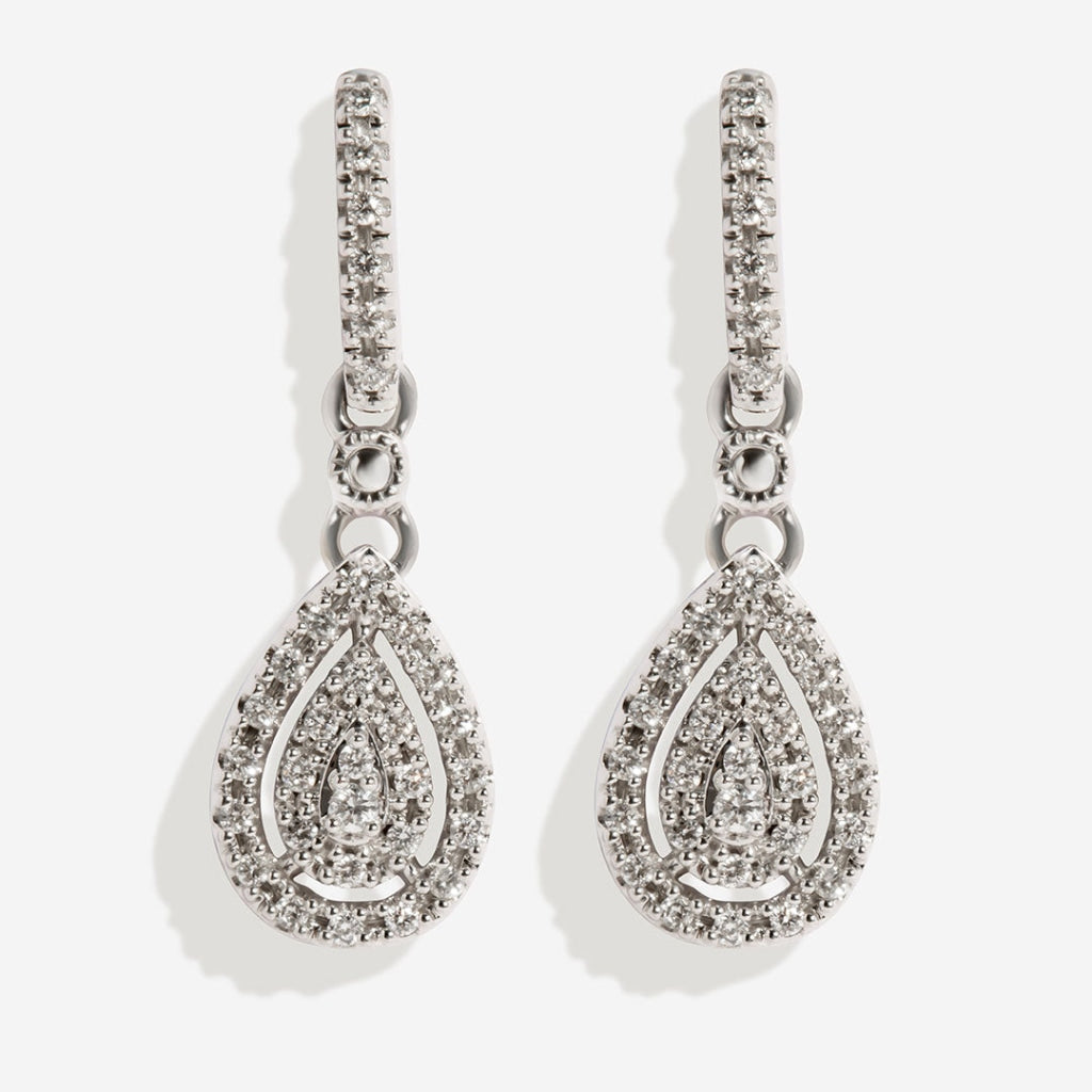 diamond drop earrings on white background